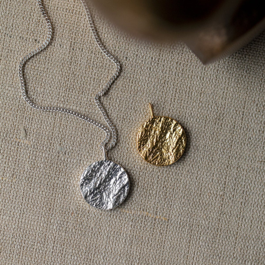 Structured Sphere pendant jewelry in gold or silver from Handcrafted - Plakatcph.com - posters, posters and home designs